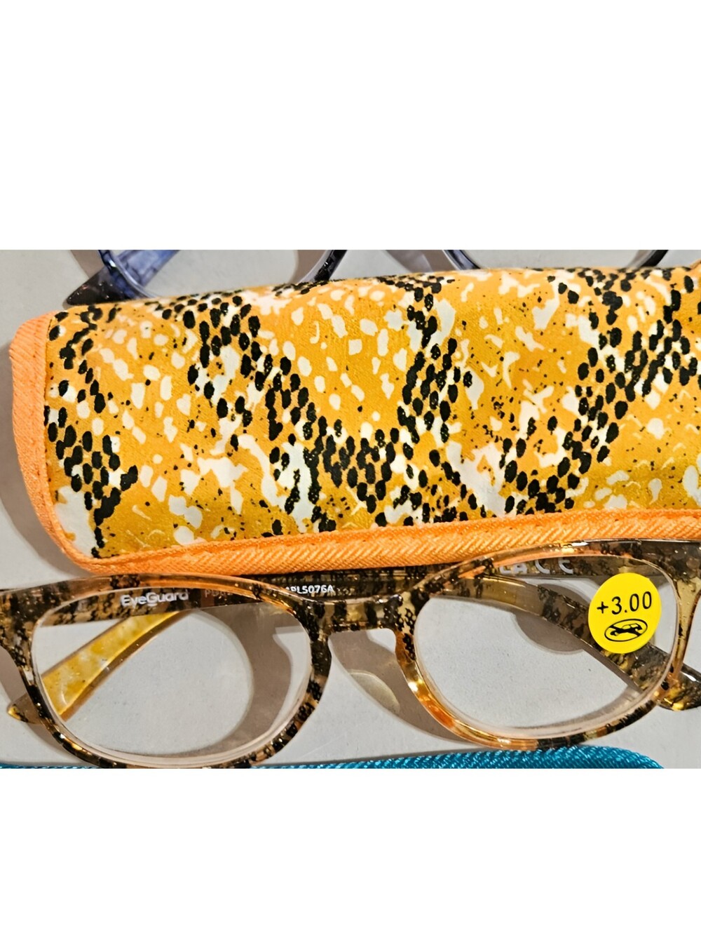 3 piece multicolor Leopard print reading glasses w/sleeve. +3.00